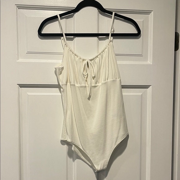 She + Sky Tops - She + Sky Ivory Ribbed Tie-Front Bodysuit